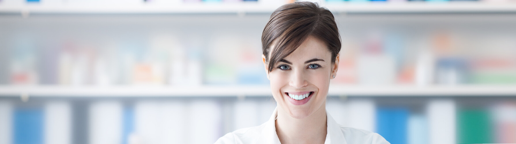 Pharmacist working at office desk