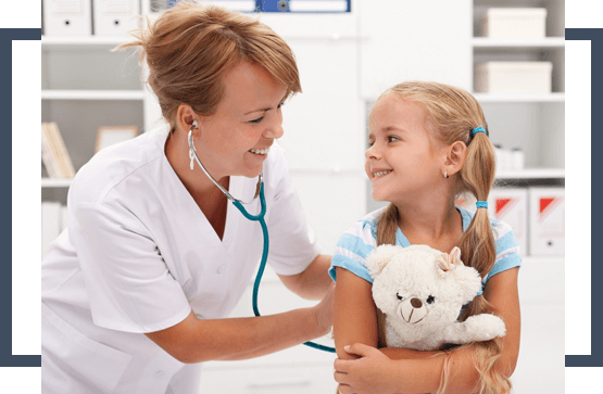 Female doctor examining a girl